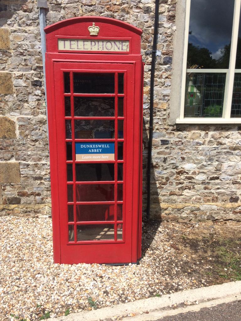 Discovering Dunkeswell Abbey red phone box display Devon