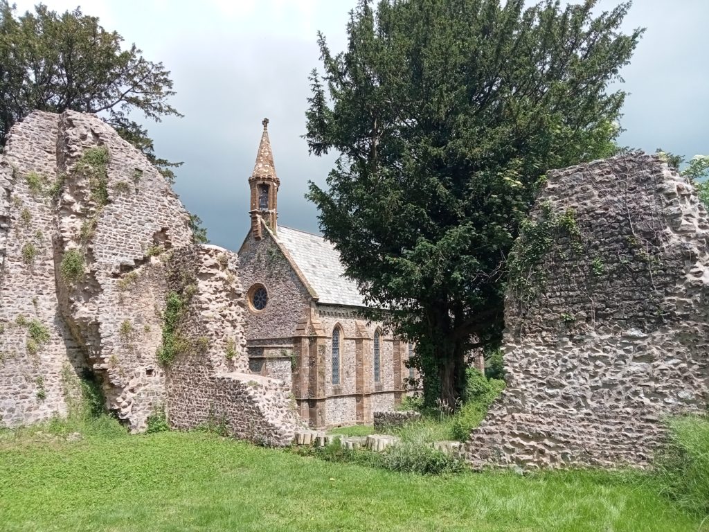 Dunkeswell Abbey Church with the Abbey Ruins in foreground